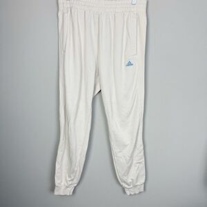 adidas White Track Joggers with Light Blue Logo